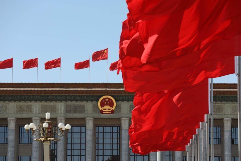 中共二十大通過《中國共產(chǎn)黨章程(修正案)》。修正后的新黨章全文26日公布。(摘自中新社).jpg