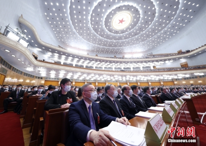 3月7日，十四屆全國人大一次會議在北京人民大會堂舉行第二次全體會議。<a target='_blank' href='/'>中新社</a>記者 盛佳鵬 攝