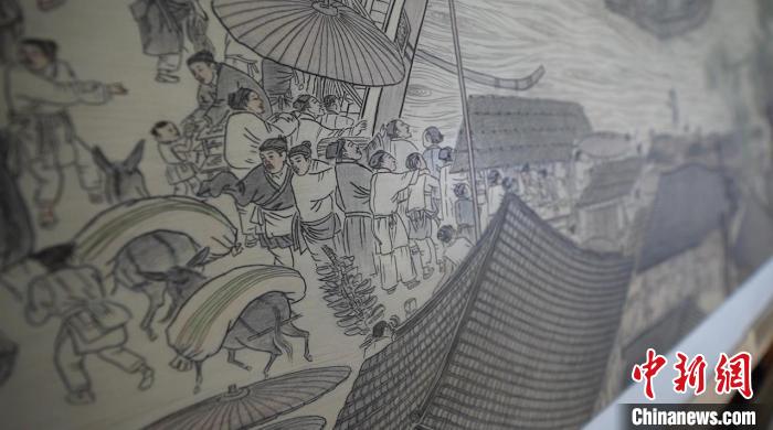 藺烈板刻線畫作品《清明上河圖》局部?！∪诸?攝