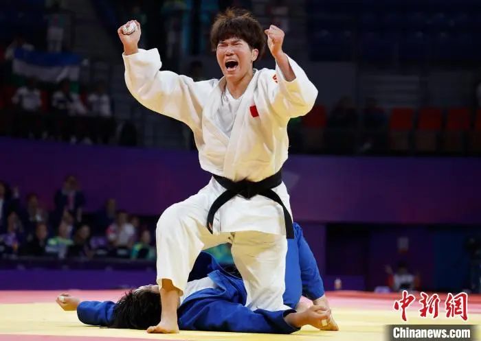 圖為馬振昭戰(zhàn)勝高山莉加。<a target='_blank' href='/'>中新社</a>記者 殷立勤 攝
